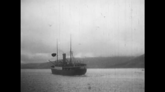 ALASKA: 1930s: ship in harbour. View towards farm. View across valley towards mountain