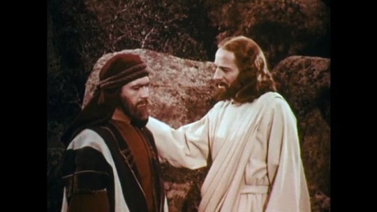 UNITED STATES: 1950s: Jesus puts hand on man