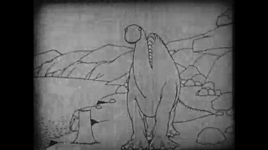 1910s: Animation, dinosaur eats tree stump, stamps feet, wooly mammoth enters. 