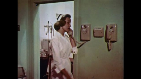 1960s: Nurse talks on phone in hospital. Man talks on phone in phonebooth. Man hangs up phone, leaves booth and talks to another man.