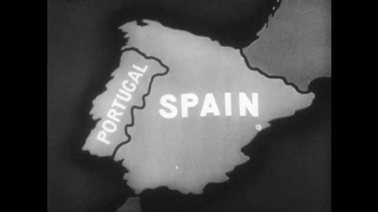 1940s: MEDITERRANEAN: Schematic map of Spain and Portugal. People and population symbols on map. Rural village