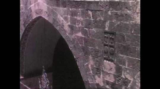 1950s: Black robed figures of Greek Orthodox Church walk the streets of Jerusalem. 