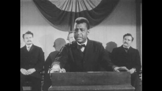 1940s: Booker emphasizes his speech with hand gestures.